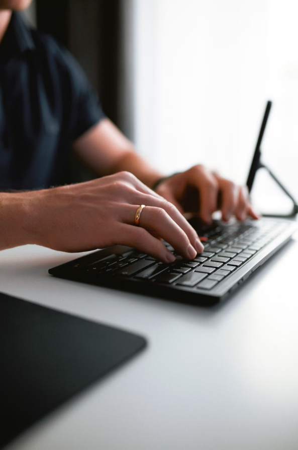 Wireless ergonomic keyboard on a home office desk