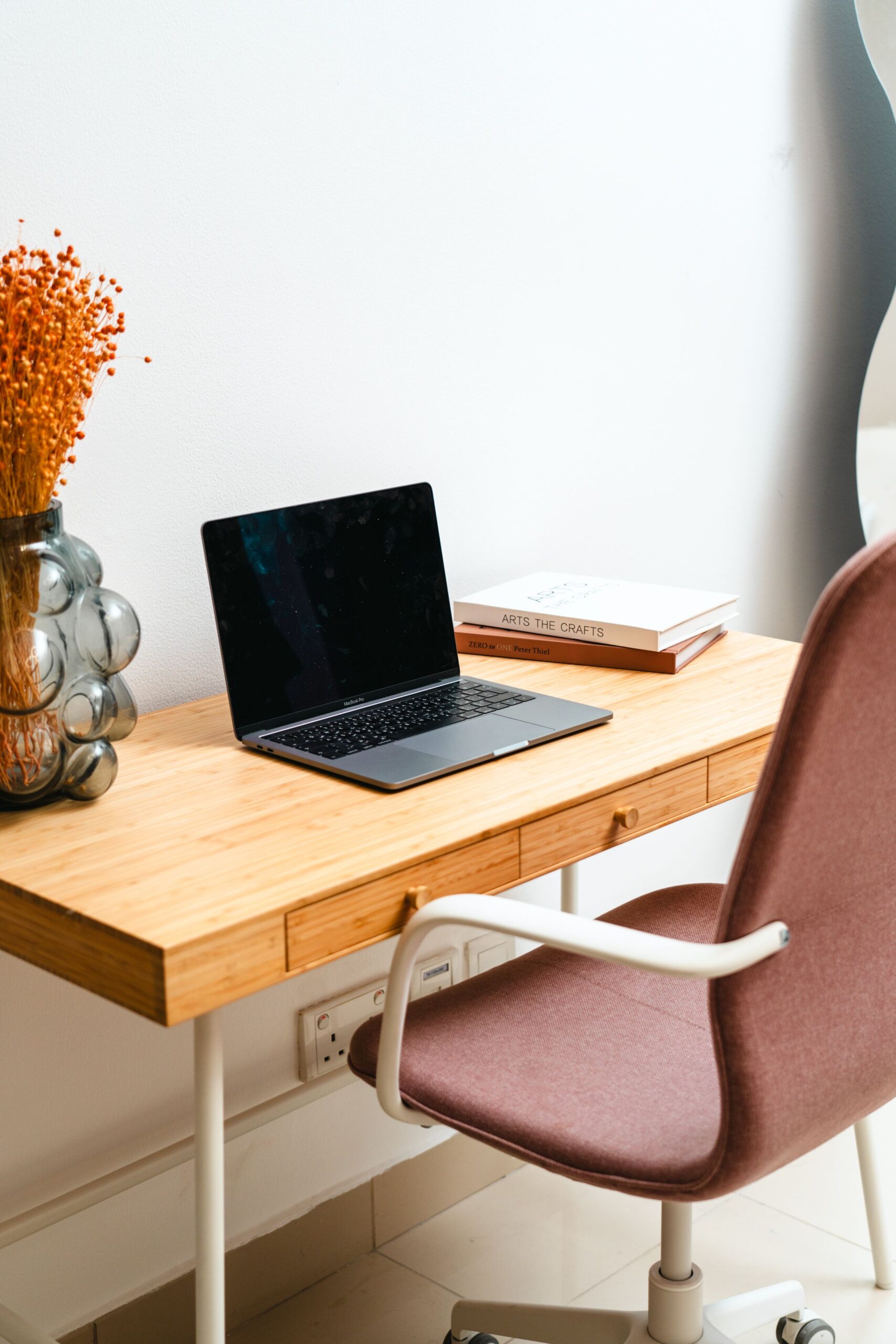 Home office desk setup illustrating standing desk warranty and buying channel